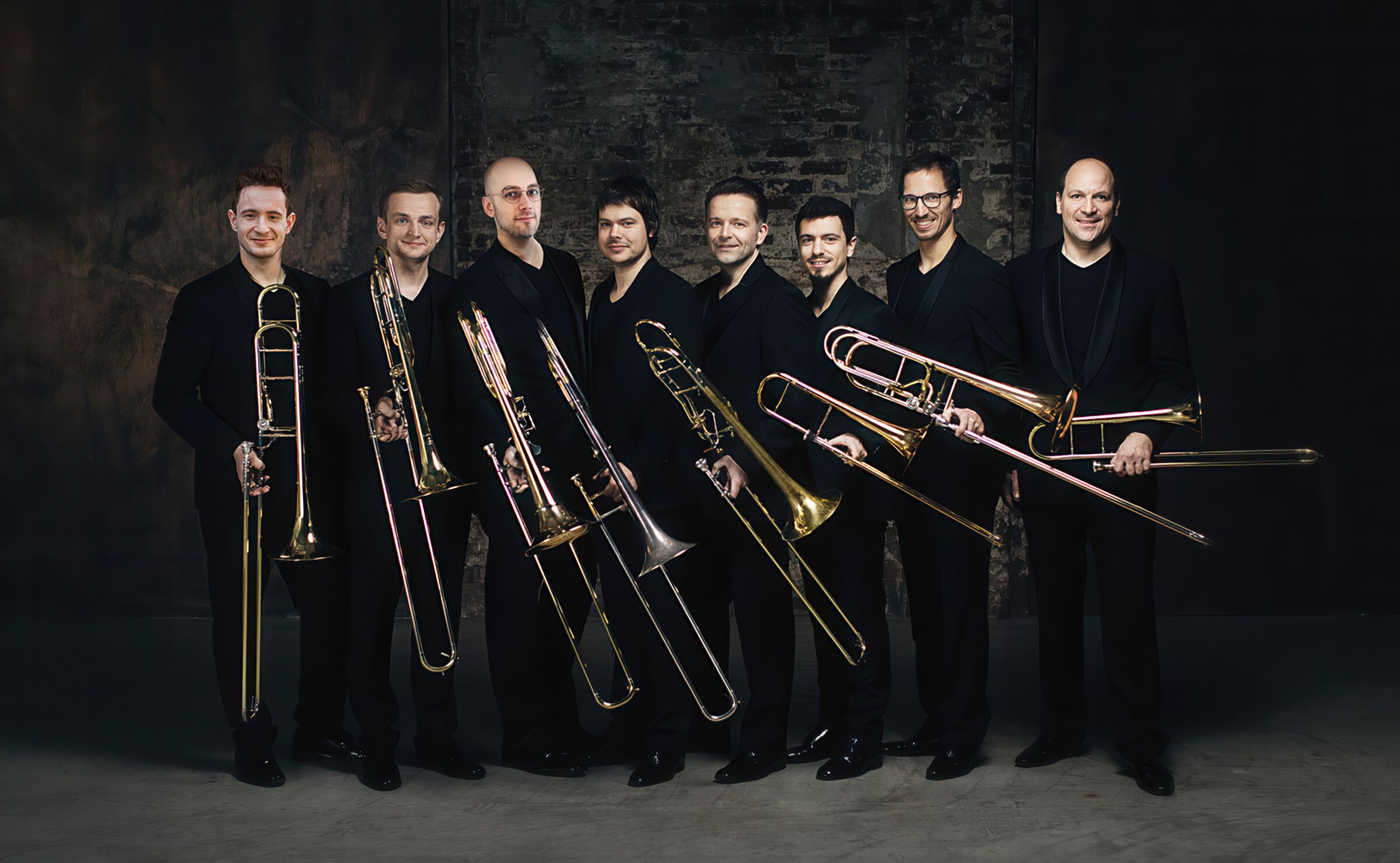 Trombone Unit Hannover ensemble holding trombones